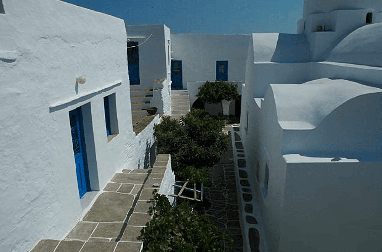 Sifnos, Exampela, Iera Moni Vrisis - Gastronomy Tours top view of the Iera Moni (Holy Monastery) Vrisis commemorate festival of her birth at Sifnos, Exampela, Greece